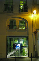 Boutique M+F Girbaud, facade at night