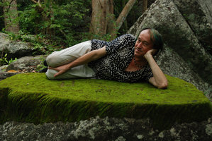 Patrick Blanc on rock covered by mosses and algae, Chumphon, Thailand, Aug. 2011