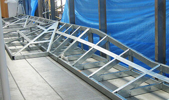 Empty metallic structure of the green bench, Shin Yamaguchi station