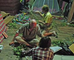 Francis Hallé and Patrick Blanc at night, preparing herbarium specimen, Hinboun, Laos, Jan. 2012