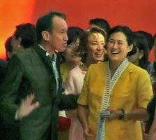 HRH Princess Maha Chakri Sirindhorn and Supaluck Umpujh laughing while Patrick Blanc explains the adventures concerning the creation of Vertical Gardens at Siam Paragon , Bangkok, Dec. 2005