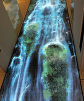 Living plant photos by Patrick Blanc integrated in the Universe of Water Particles digital waterfall by TeamLab in 2016 for Ginza Six, Tokyo, an inspiration for Changi T2 airport