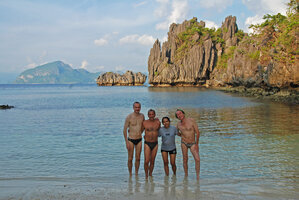 Mark Hughes, Pascal Heni, Rosario Rubite and Patrick Blanc in front of the karst sea exposed cliff habitat of Begonia elnidoensis, El Nido, Palawan, Philippines, May 2011