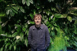 Nicolas Hulot in his Fondation, in front of the Vertical Garden by Patrick Blanc, Photo François Guillot