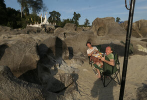 Pascal Héni and Patrick Blanc at picnic lunch on an island of the Malikha river, Putao, Kachin, Myanmar, Dec. 2017