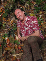 Patrick Blanc among blackish, greenish and mottled forms of Begonia blancii, El Nido, Palawan, Philippines, March 2014