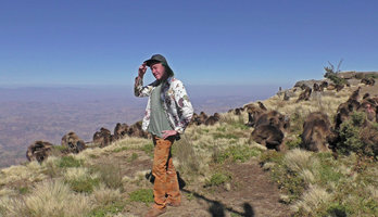 Patrick Blanc among Gelada Baboons, Theropithecus gelada, Simien NP, Ethiopia, Jan. 2019