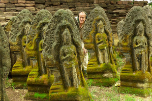 Patrick Blanc among old statues covered by mosses, Phimai, Thailand, June 2016
