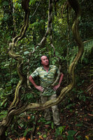 Patrick Blanc among the woody climbing stems of Bauhinia scandens, Kaeng Krachan NP, Thailand, March 2022
