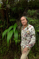 Patrick Blanc and a flowering individual of Spathoglottis pacifica, Des Voeux peak, Taveuni, Fiji, Aug. 2016
