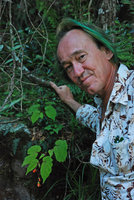 Patrick Blanc and Begonia sutherlandii growing on a vertical rock, Royal Natal NP, South Africa, Dec 2008