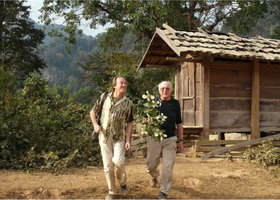 Patrick Blanc and Francis Hallé holding a Mussaenda sample, Hinboun, Laos, January 2012