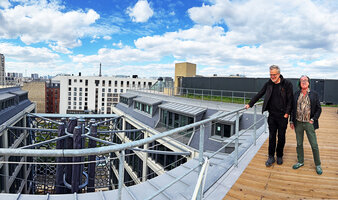 Patrick Blanc and Franck Michigan above the nine columns of the Symbiose project, just waiting for plant installation at the Mutualite Française, Paris, May 2026