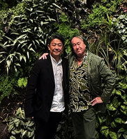 Patrick Blanc and Kentaro Ishida in front of the vertical garden at Kawamura Denki, Nagoya, April 2026