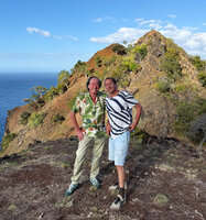 Patrick Blanc and Pascal Héni in front of a hill covered with dispersed Eucalyptus alba with characteristic bright white bark, Manatuto lookout, Timor-Leste, Aug. 2026