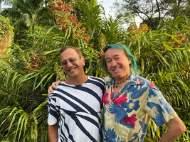 Patrick Blanc and Pascal Heni in front of the oldest cultivated Grammatophyllum speciosum since it was planted at this place in 1861, Botanic Gardens, Singapore, Oct. 2023