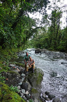 Patrick Blanc and Pascal Heni on the rocky banks of a fast flowing river, Imbu Rano, Kolombangara, Solomon Islands, Sept. 2019
