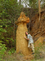 Patrick Blanc appressed against a beautiful stone structure, Phae Muang Phee canyon, Phrae, Thailand, June 2016