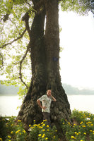 Patrick Blanc at the base of an old Bombax ceiba, Hanoi, Vietnam, Nov. 2017
