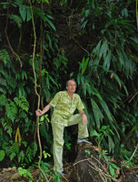 Patrick Blanc at the base of a vertical earth bank covered by a Cyclanthaceae species, probably an Asplundia, Osa, Costa Rica, Jan. 2011