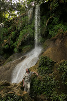 Patrick Blanc at the base of a waterfall mostly covered by Adiantum capillus-veneris, El Nicho, Cienfuegos, Cuba, Feb.2017