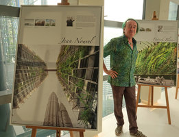 Patrick Blanc between the posters presenting Jean Nouvel and himself inside the Towers covered by 243 climbing plant species, Kuala Lumpur, Aug. 2018