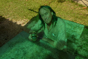 Patrick Blanc drinking a beer under a green screen, Khao Sok NP, Thailand, Dec. 2015