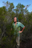 Patrick Blanc emerging from the dense population of Erica mafiensis, Ngezi FR, Tanzania, Jan. 2021