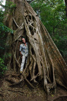 Patrick Blanc emerging from the root system of a strangling Ficus, Rincon, Costa Rica, Dec 2010