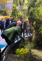 Patrick Blanc explaining to Teo Chee Hean, Minister for National Security and Lee Seow Hiang, the role of aquatic plants in the Dreamscape Garden ecosystem during the inauguration of the Changi T 2 expansion, 1st November 2023
