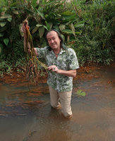 Patrick Blanc holding a specimen of Ottelia, Yaounde, Cameroon, March 2018
