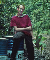 Patrick Blanc holding the first collected specimen of the new Cercestis species that he discovered during the Canopy Raft expedition, Campo, Cameroon on 10th Dec. 1991. and now named Cercestis blancii, 34 years later, photo by Pascal Héni
