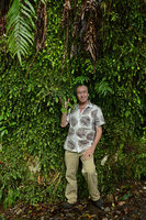 Patrick Blanc in front of a cliff totally covered by a climbing Metrosideros species, Rotorua, New Zealand