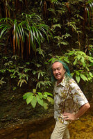 Patrick Blanc in front of a damp vertical cliff covered with Xyris grandis and Phyllagathis cf. tuberculata, Harau valley, Sumatra, Dec. 2016