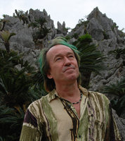 Patrick Blanc in front of a limestone cliff covered in  Cycas revoluta, Okinawa, Japan, April 2012