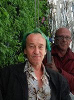 Patrick Blanc in front of his Vertical Garden, Torre de Cristal, Madrid