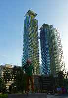 Patrick Blanc in front of Le Nouvel Towers covered by 243 different species of lianas on the 200 m high towers, Kuala Lumpur, Dec. 2016