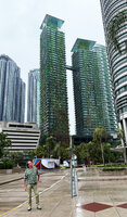 Patrick Blanc in front of Le Nouvel towers to check the growth of the climbing plants that he installed around ten years before, Kuala Lumpur, Sept. 2025