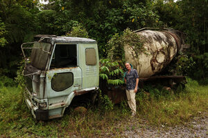 Patrick Blanc in front of n old concrete mixer truck on the way to Penrissen Range, Sarawak, Borneo, Oct 2014