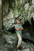 Patrick Blanc looking at Monophyllaea pendula at the entrance of Clearwater cave, Gunung Mulu NP, Sarawak, Borneo, Sept. 2018