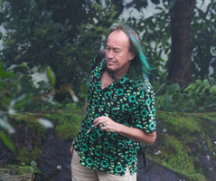 Patrick Blanc looking at mossy rocks, Maragunda, Karnataka, India, June 2018