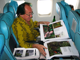 Patrick Blanc looking at the pages of his book Vertical Garden before printing on the way to Istanbul, Sept. 2007