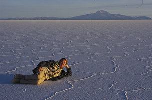 Patrick Blanc lying on the salar Uyuni, Bolivia, June 2000
