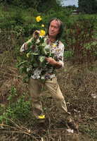 Patrick Blanc observing a flowering Merremia umbellata along the main road Kribi to Edea, March 2018