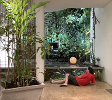 Patrick Blanc observing the fish inside the Christarium, July 2019