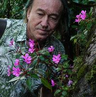 Patrick Blanc observing the flowers of Impatiens chevalieri, Dambri Waterfall, Bao Loc, Vietnam, Nov. 2019