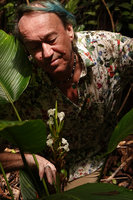 Patrick Blanc observing the inflorescence of a big leaved Mrantaceae, probably a Phrynium, Tenaru Falls, Guadalcanal, Solomon Islands, Sept. 2019