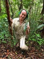 Patrick Blanc observing the very long petiolate leaf of Aspidistra cf. heterocarpa var. heterocarpa, Bach Ma NP, 500 m asl, Hue, Vietnam, Oct.2018