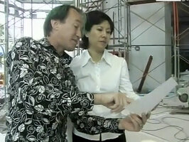 Patrick Blanc showing to Siriluck Maithai the final design of the vertical garden at Siam Paragon, Bangkok, Dec. 2005 