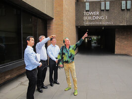 Patrick Blanc showing to Stanley Quek the growth of the plants on the vertical gardens, One Central Park, Sydney, Nov. 2012